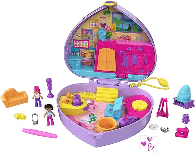 The Polly Pocket Starring Shani Art Studio Compact, Micro Shani and Friend Dolls, 5 Reveals, 12 Accessories, Pop and Swap Feature, 4 and Up